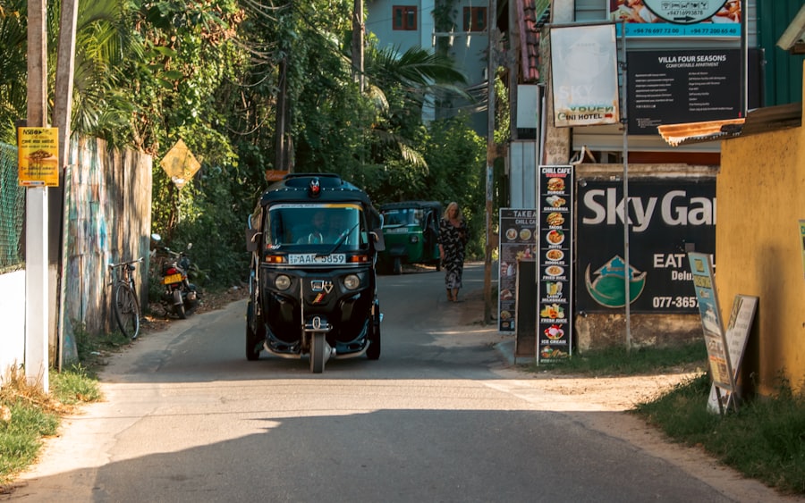 A tuk-tuk coming down a street in Mirissa, Sri Lanka